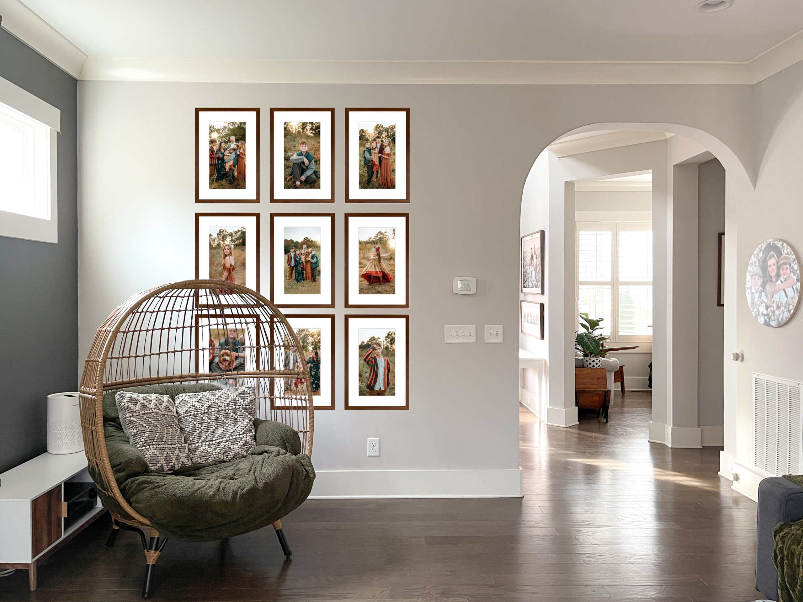 photo of a wall gallery with framed family photos