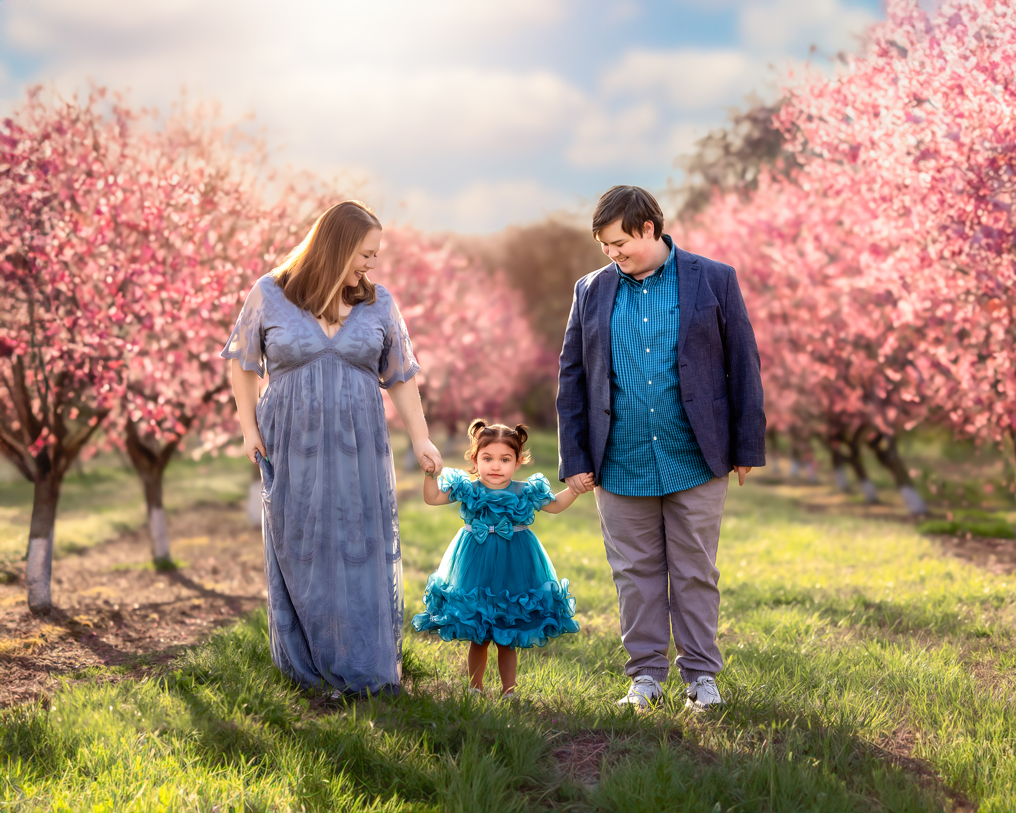 Family photos in the peach orchards at Millstone Creek Orchards