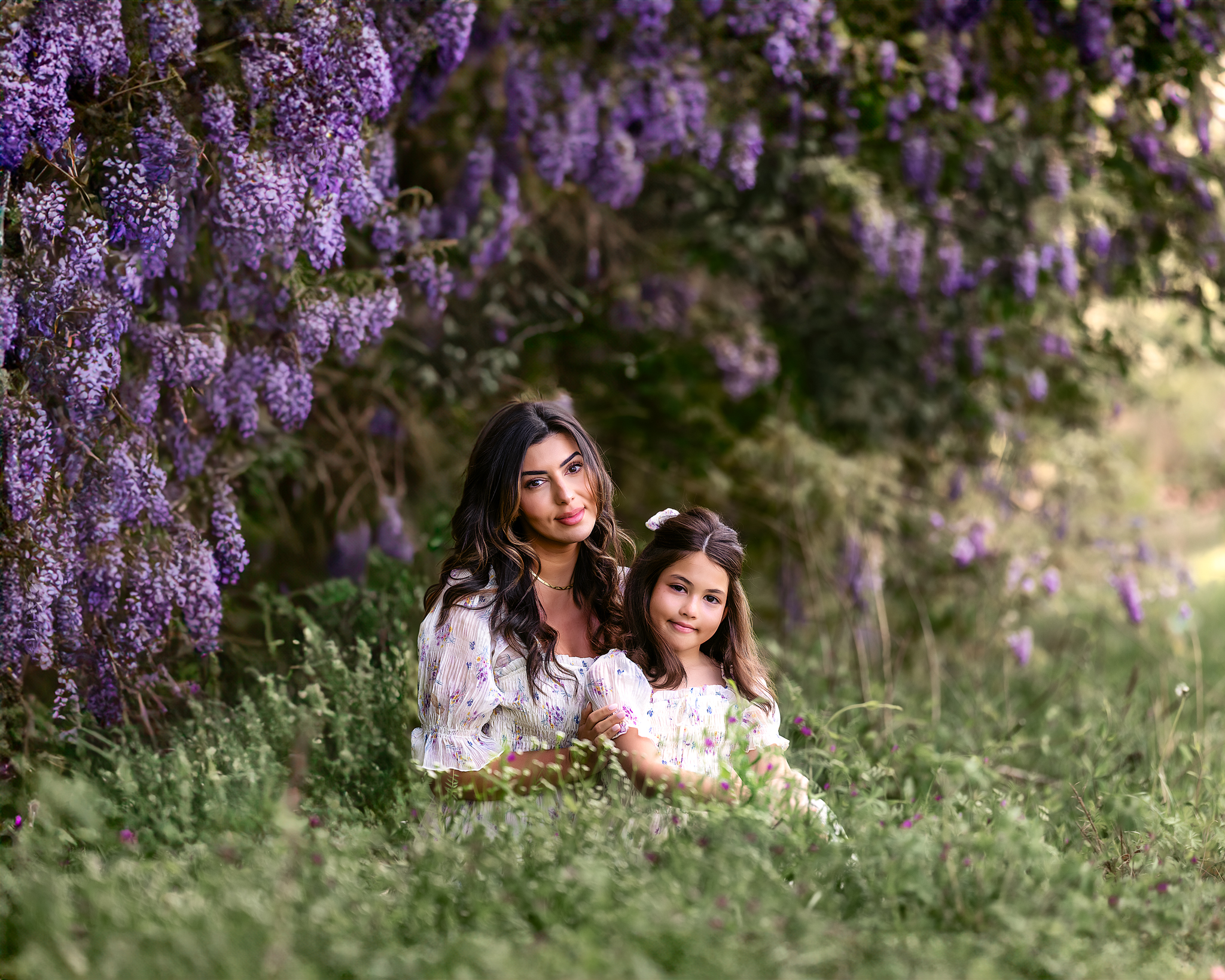photo of a mother and daughter in matching dresses from Ele Story wisteria photos Raleigh NC